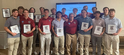 Smolka Endowed Scholarship recepients holding up their certificates