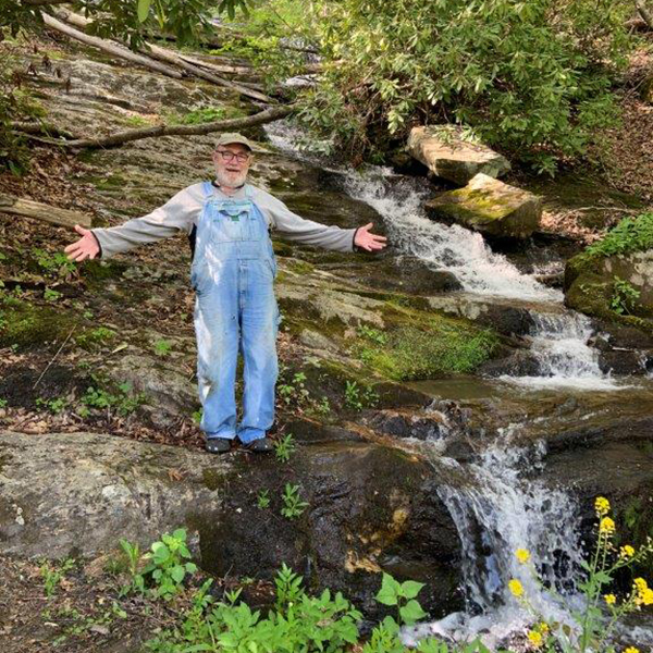 Dr Wally Peters at a creek