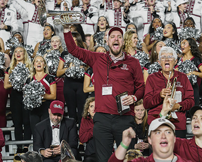 Carolina Marching Band with competition attendees and the USC cheerleading squar
